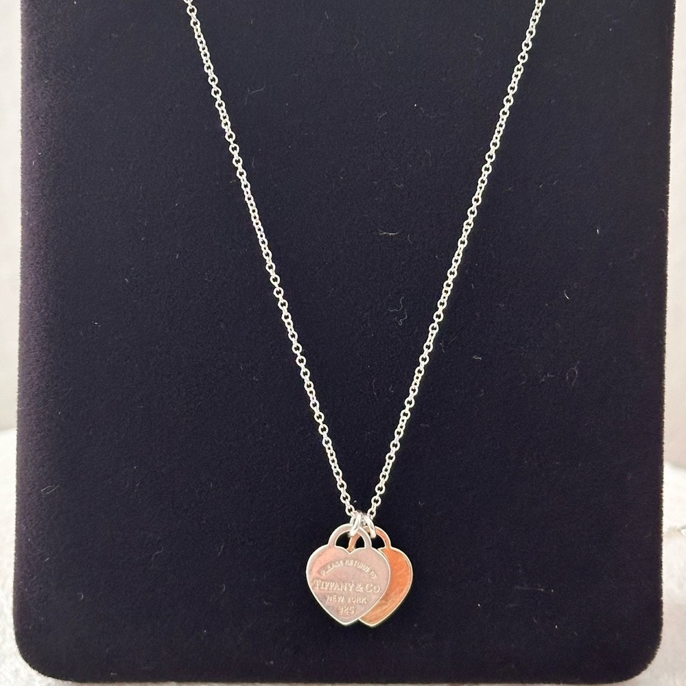 Mini double heart tag pendants in sterling silver & rose gold. 16” chain.